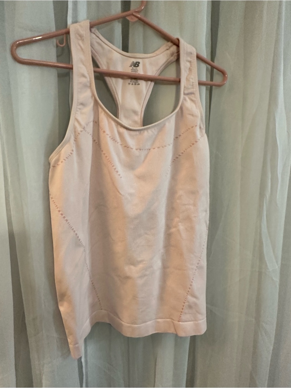 New Balance Women’s Light Pink Racerback Tank Top with built in bra